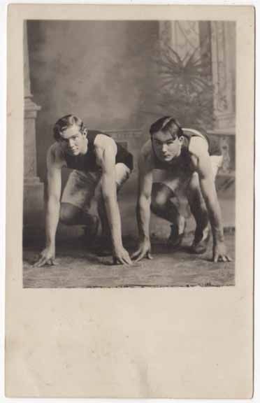 Real Photo Postcard of Two Track Running Boys Posing in a Photo Studio 