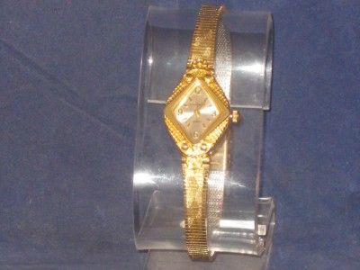 WOMENS CLAREMONT GOLDTONE QUARTZ WATCH DIAMOND SHAPE DRESS IT UP OR 