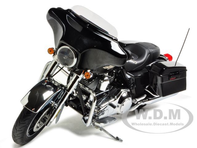   diecast model of 2011 harley davidson flhx street glide vivid black