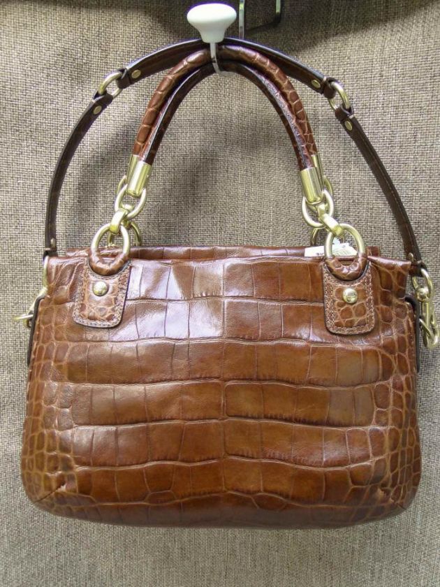   with leather pull dust bag included new with tag mfsrp $ 598